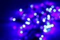 Bright blue and violet pentagon bokeh night illumination. Vibrant colorful background. Template. Pattern Royalty Free Stock Photo