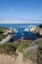 Bright blue water in the Pacific Ocean near Big Sur California along the Pacific Coast Highway Royalty Free Stock Photo