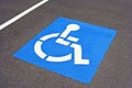 Bright blue and white handicapped parking symbol Royalty Free Stock Photo