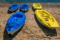 Bright blue and yellow kayak boats Royalty Free Stock Photo