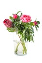 Bright bouquet of freshly cut flowers in a glass vase on a clean Royalty Free Stock Photo