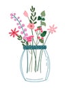 A bright bouquet of wild flowers in a glass jar on a white background. Spring flowering. Minimalist postcards for