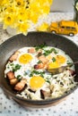 Bright breakfast in yellow, baby breakfast, egg with bacon, breakfast with flowers, breakfast and narcises, food, egg fried, food Royalty Free Stock Photo