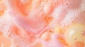 Bright bubbles in a soft pink liquid during a relaxing bath experience Royalty Free Stock Photo