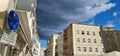 Bright buildings in Passau, Germany, with storm clouds above Royalty Free Stock Photo