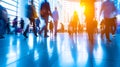 Bright Business Workplace With People Walking In Blurred Motion - A Group Of People Walking In A Building Royalty Free Stock Photo