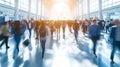 Bright Business Workplace With People Walking In Blurred Motion - A Group Of People Walking In A Large Building Royalty Free Stock Photo