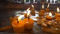 Bright praying Candle light in a temple