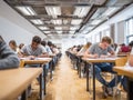Bright and cheerful exam hall filled with students focused on their tests. atmosphere is studious and collaborative, showcasing Royalty Free Stock Photo