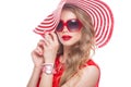 Bright cheerful girl in summer hat, colorful make-up, curls and pink manicure. Beauty face. Royalty Free Stock Photo