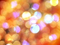 Bright cheerful orange and pink round blurred lights glowing abstract