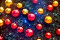 Bright and glistening red and gold christmas baubles on a pine fur christmas tree Royalty Free Stock Photo