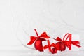 Bright christmas background - group festive white gift boxes, shine red balls with red satin ribbons in decorative fairy winter.