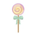 Bright Christmas candy in caramel with a green bow on a stick. Round sweet lollipop. New Year s candies. Christmas Royalty Free Stock Photo