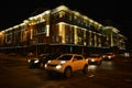 The renovated building of the DniprÃÂ¾ Railway with LED lighting located in the city center, along Dmitry Yavornitsky Avenue.