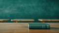 A bright classroom filled with wooden desks, a blackboard, and a stack of textbooks, ready for learning and discovery Royalty Free Stock Photo