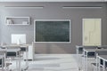 Bright classroom interior with empty blackboard Royalty Free Stock Photo