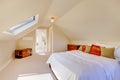 Bright clean attic bedroom in the small home.