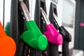 bright clean pistols at a gas station with fuel for a car. Royalty Free Stock Photo