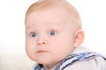 Bright closeup picture of blue-eyed baby boy