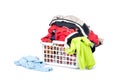 Bright clothes in a laundry basket Royalty Free Stock Photo