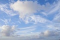 Bright clouds, blue sky on a beautiful summer afternoon. Cloudscape and the sun shining on an overcast day with copy Royalty Free Stock Photo