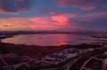 Bright cloudy sky purple violet pink colors sunset over Torrevieja salt lake Las Salinas view from above Royalty Free Stock Photo