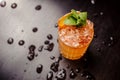 Bright cocktail with mint leaves and an orange slice Royalty Free Stock Photo