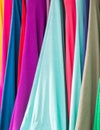 Bright color juicy fabrics of different shades. Light airy matter. Bright background