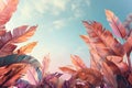 Bright color tropical leaves against a blue sky. Pastel tone background