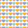 Bright colored cute hearts fill the entire space. Vector seamless background