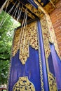 Bright colored and decorated wooden door in the entrance of a public Hindi temple in Bali, Indonesia