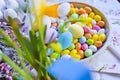 Bright colored eggs, large and small for Easter Sunday. Traditional treats. Copy space. Background of colored eggs Royalty Free Stock Photo