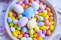 Bright colored eggs, large and small for Easter Sunday. Traditional treats.