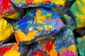 Bright colored stones with paint Royalty Free Stock Photo