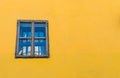 Bright colored wall with window on the medieval streets of Sighisoara Royalty Free Stock Photo