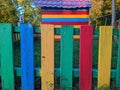 bright and colored wooden fence in the playground Royalty Free Stock Photo