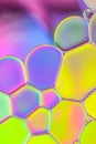 Bright Colorful Abstract Background Closeup Oil Drops in Water. Macro Photo of Liquid Surface with Green, Pink, Violet, Yellow Royalty Free Stock Photo