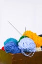 Bright colorful balls of yarn on white background. Royalty Free Stock Photo