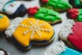 Bright and colorful, beautifully decorated Christmas cookie made to look like a yellow mitten