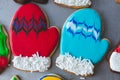 Bright and colorful, beautifully decorated Christmas cookies made to look like mittens