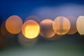 Bright colorful bokeh circles at night. Blurred city lights background Royalty Free Stock Photo