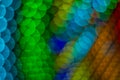 bright colorful bokeh festive Christmas lights from garland lamps illumination abstract unfocused vivid green blue and orange Royalty Free Stock Photo