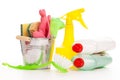 Bright colorful cleaning set on a wooden table