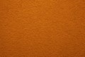 Bright, colorful concrete wall texture, painted background - orange color. Wallpaper plaster Royalty Free Stock Photo