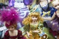 Porcelain dolls in bright colorful dresses