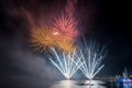 Bright and colorful fireworks against a black night sky. Royalty Free Stock Photo