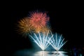 Bright and colorful fireworks against a black night sky.Fireworks for new year. Beautiful colorful fireworks display on the urban Royalty Free Stock Photo