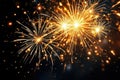 bright golden fireworks exploding in the night sky with sparkling trails and glowing light effects creating a festive atmosphere Royalty Free Stock Photo