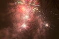 Bright colorful fireworks on new years eve in Ostrava, Czech republic against cloudy sky Royalty Free Stock Photo